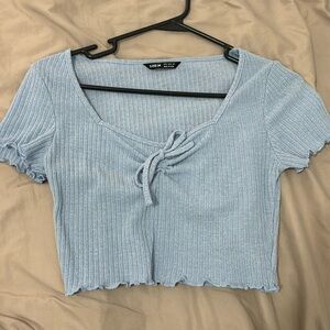 Light blue crop top bow in front size small from shein
